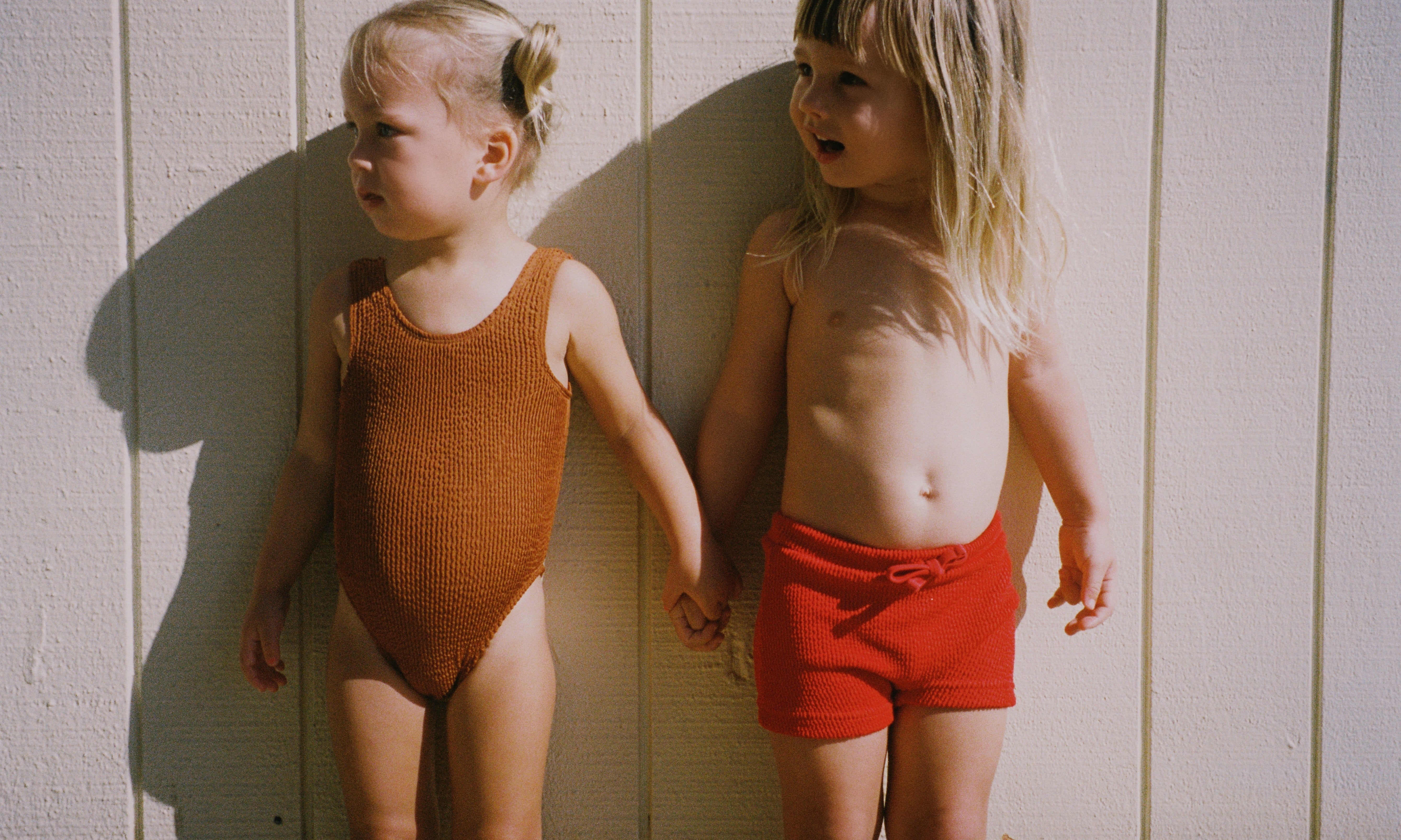 Matching kids mini red and brown swimwear 
