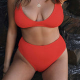 Textured red flattering scoop neck bikini top with thick shoulder straps and adjustable tie-back. 