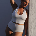 White bridal textured halter bikini top with built-in support, flattering plunge neckline and adjustable tie-neck.