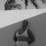 White high-waisted, cheeky cut bikini bottom made from premium textured 5D fabric with power mesh lining to contour, sculpt and give superior support.