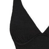 Textured black full coverage one piece swimsuit with a flattering plunge neckline, underwire bust support and adjustable shoulder straps.