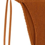 Caramel brown textured tie side bikini bottom designed to fit and flatter curves. 