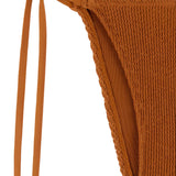 Caramel brown textured tie side bikini bottom designed to fit and flatter curves. 
