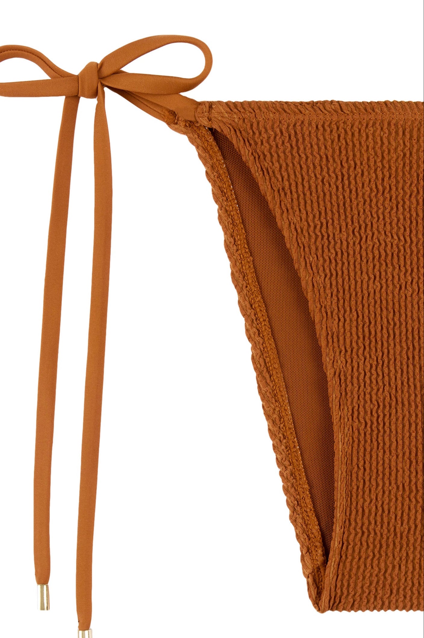 Caramel brown textured tie side bikini bottom designed to fit and flatter curves. 