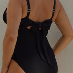 Textured black full coverage one piece swimsuit with a flattering plunge neckline, underwire bust support and adjustable shoulder straps.