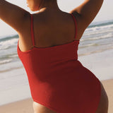Textured Red flattering, full coverage swimsuit with adjustable shoulder straps and in-built shelf bra. 