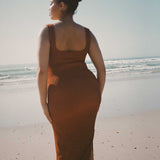 Caramel brown textured bodycon midi dress with inbuilt bra support, square neckline, side split and a sleek, sculpting fit. 