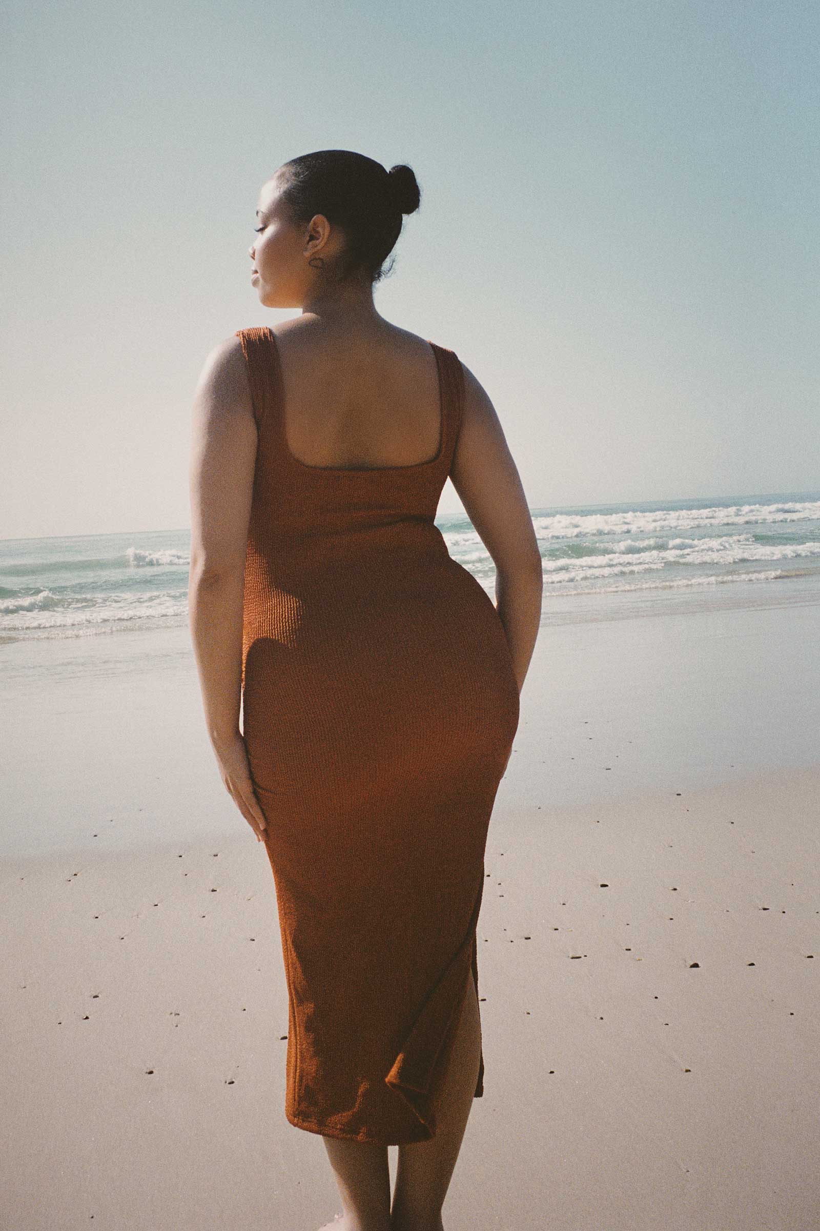 Caramel brown textured bodycon midi dress with inbuilt bra support, square neckline, side split and a sleek, sculpting fit. 