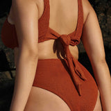 Caramel brown high-waisted, cheeky cut bikini bottom made from premium textured 5D fabric. 