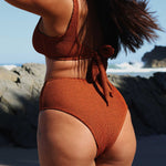 Caramel brown high-waisted, cheeky cut bikini bottom made from premium textured 5D fabric with power mesh lining to contour, sculpt and give superior support.