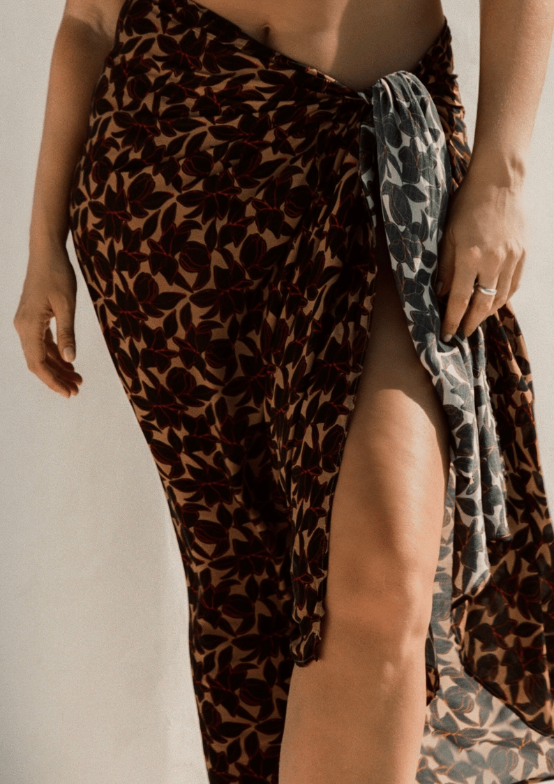 bokumaia noir hibiscus sarong styled with matching bikini floral swim cover up