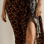 bokumaia noir hibiscus sarong styled with matching bikini floral swim cover up