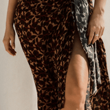 bokumaia noir hibiscus sarong styled with matching bikini floral swim cover up