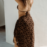 bokumaia noir hibiscus sarong side angle tied waist matching bikini resort wear beach outfit