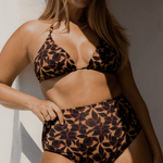 Model Bree McCann wearing Bokumaia Fior Bottom in Noir Hibiscus – high-waisted full coverage bikini brief