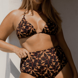 Model Bree McCann wearing Bokumaia Fior Bottom in Noir Hibiscus – high-waisted full coverage bikini brief