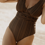 Close-up of Bokumaia Gaia One Piece Mocha Stripe – flattering ruched waist and structured support