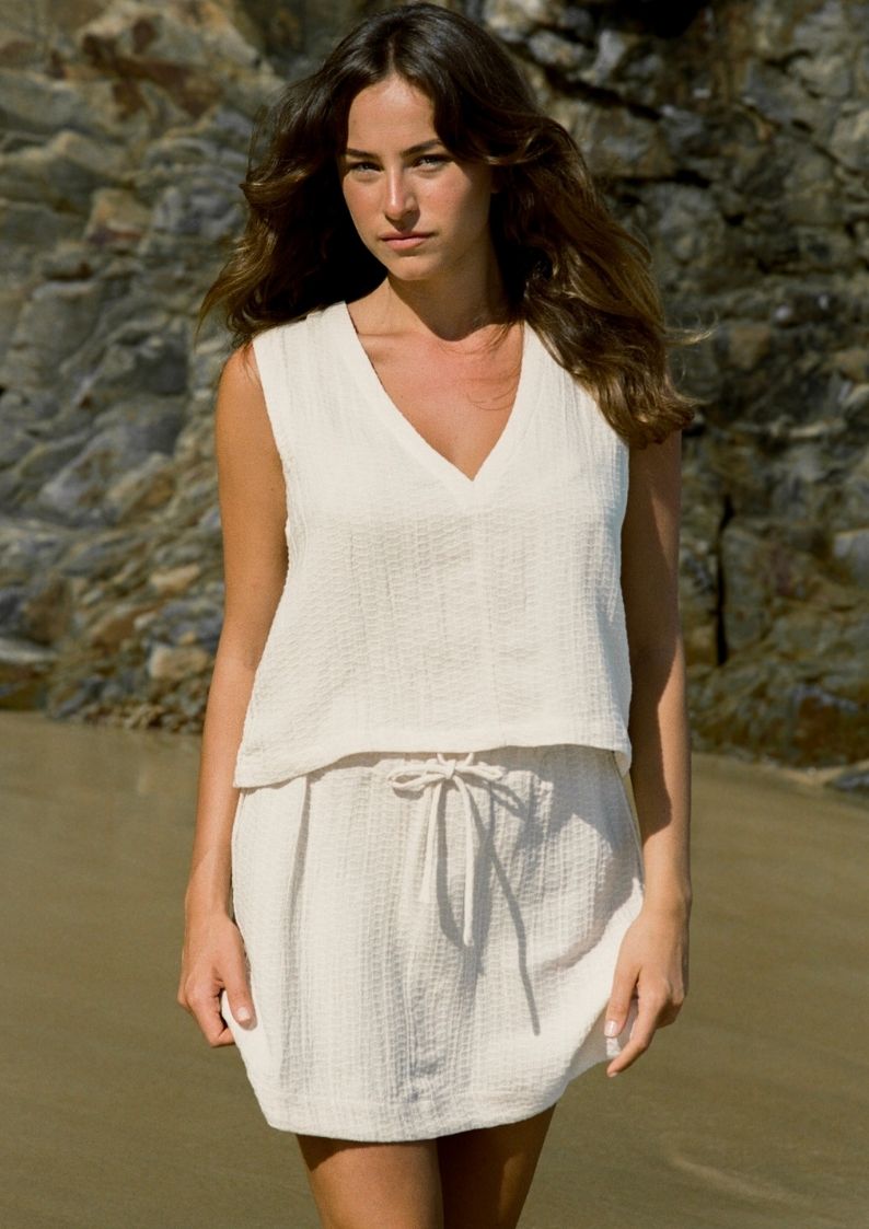 Sahara Mini Skirt Ecru styled for casual coastal dressing in linen blend