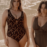 Bokumaia Zinnia One Piece Noir Hibiscus – full coverage floral swimsuit styled at the beach